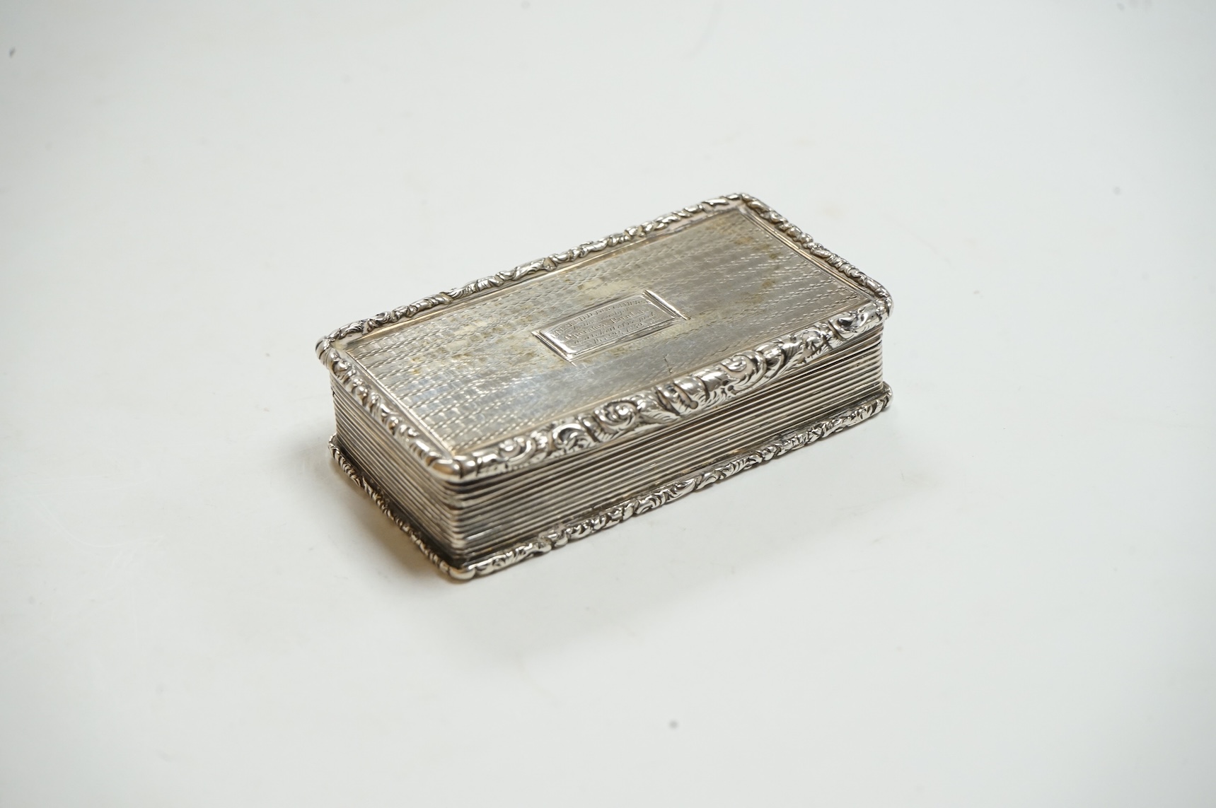 A William IV engine turned silver rectangular snuff box, by William Pugh, Birmingham, 1831?, 72mm.